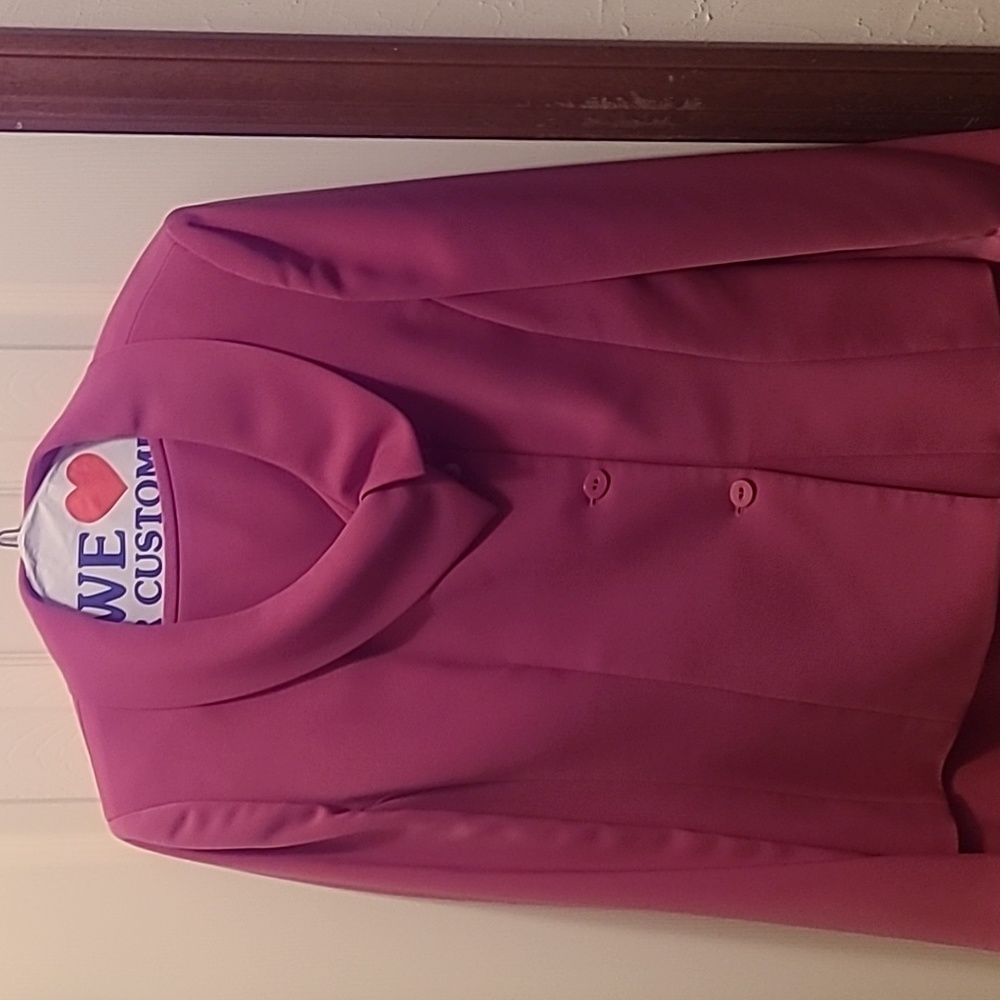Two-piece suit with jacket and skirt. 100% Polyester